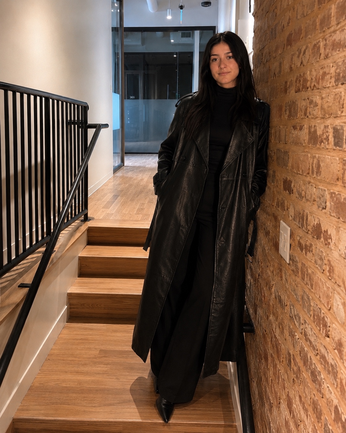 Fashion editorial portrait in a black leather coat